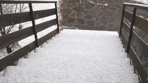 Stairs going down with snow while it is snowing. Stock Footage 139690871