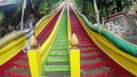 Stairs going up to top floor of Tiger Cave Temple (Wat Tham Sua), Kanchanaburi Stock Footage 86687953