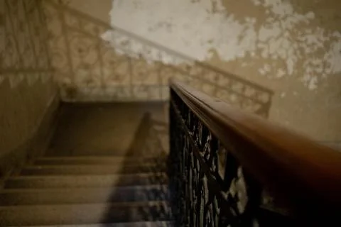 Stairs inside an old building going down Stock Photos