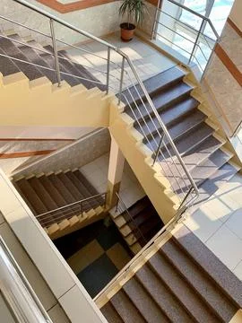 The stairs lead to the second and third floors of the hospital. Stock Photos