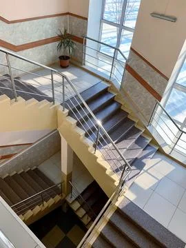 The stairs lead to the second and third floors of the hospital. Stock Photos