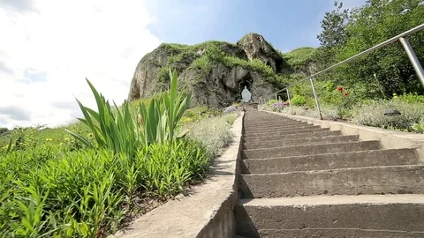 Stairs leading up to a rock Stock Footage 70154535