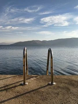 Stairs leading to the vast Sevan Lake in Armenia Stock Photos