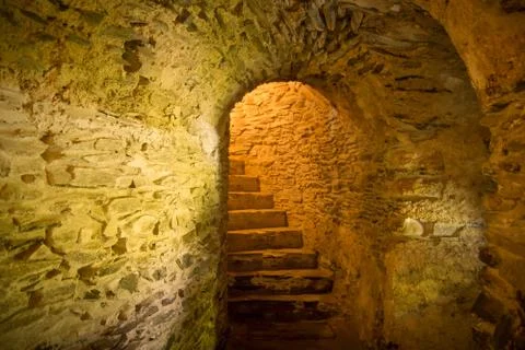 Stairs in medieval cellar Stock Photos