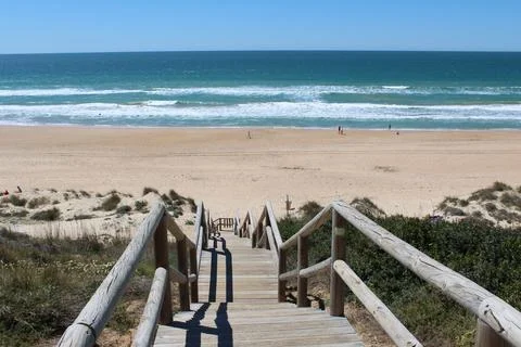 Stairs to the ocean in Spain Stock Photos
