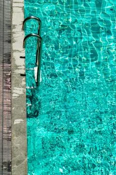 Stairs into the pool. Stock Photos