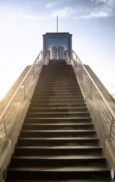 Stairs up tp a small tower. Stock Photos