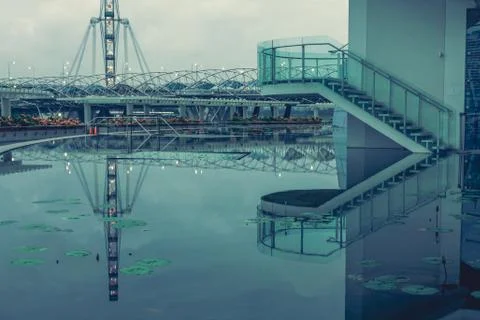 Stairs by the water with reflection Stock Photos