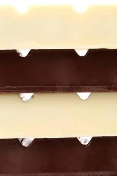  Stake of different chocolate bars. Stake of different chocolate bars. Who... Stock Photos