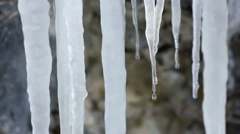 Stalactite ice ( icicles ) melting and drops, available in both 25 fps and 29 Stock Footage 54098808