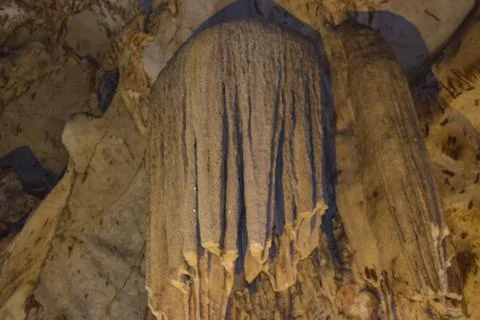 Stalactites in the dark cave Stock Photos