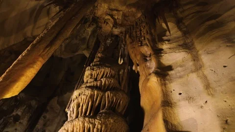 Stalactites hanging from ceiling in Australian cave complex - HD 25P. Stock Footage 87850004