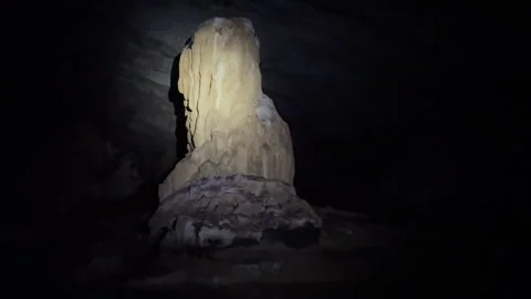 A stalagmite in Sumaguing Cave, Philippines illuminated by soft light Stock Footage 312976333