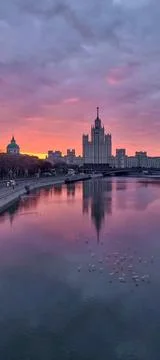 Stalinist skyscraper on the banks of the Moscow river at dawn Stock Photos