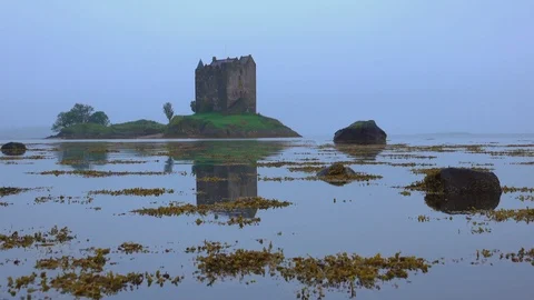 Stalker Castle reflected in the water Stockbeeldmateriaal 127210838