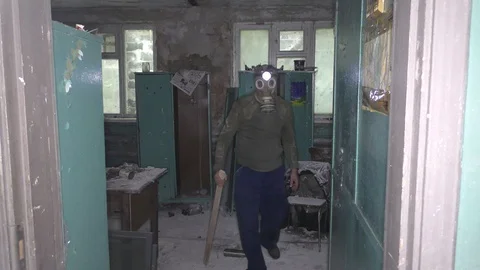 Stalker in the Chernobyl zone, exploring new objects. Stock Footage 115611801