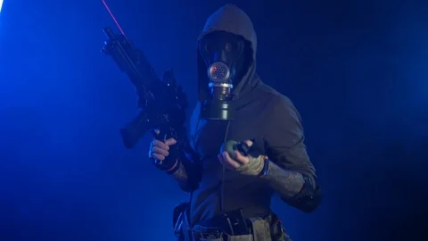 Stalker guy throws a grenade in his hand Stock Footage 117401394