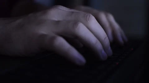 Stalker use laptop in night. close-up criminal's hand stalker on laptop. Stock-Footage 234504257