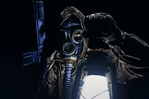 Stalker warrior in protective soviet gas mask. Stock Photos