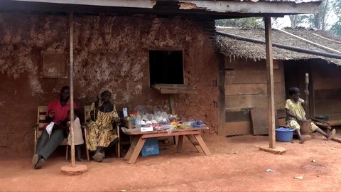 Stall in front of a mud-bricks house Stock Footage 80621098