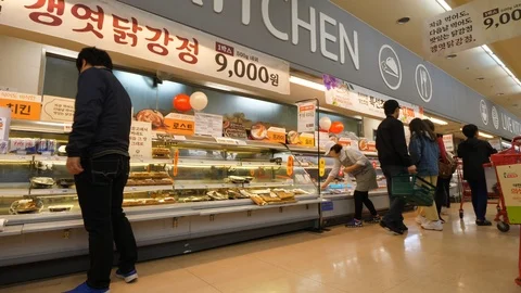 Stalls at kitchen section of large supermarket, Asian people walk by Stock Footage 125018275