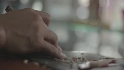 Stamp maker working at his stall on the sidewalk Stock Footage 230088442
