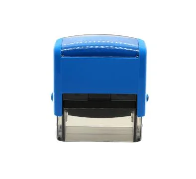 Stamp plastic typesetting for office stands vertically isolated on a white ba Stock Photos