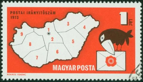 Stamp shows Postal Zone Map of Hungary and letter-carrying crow, circa 1973 Stock Photos