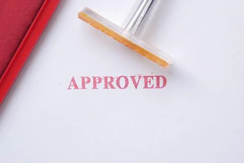 Stamping Document with Approving Contract close up Stock Photos