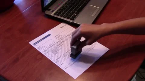 Stamping Invoice as Paid Video stock 19811049