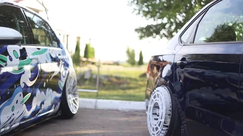 Stance car projects in nature one in airbrush and the other with a turbofan Stock Footage 162726181