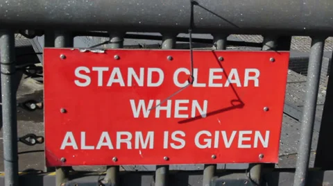 Stand clear when alarm is given sign Stock Footage 35888775