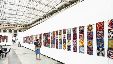 Stand with handmade patchwork carpets in Moscow Stock Photos