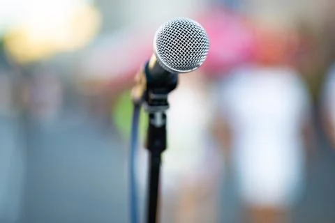 Stand microphone on blurry background Stock Photos