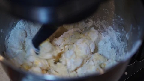 Stand mixer preparing Dough. Electric Hook Machine mix Flour Water slow motiion. 스톡 동영상 127790370