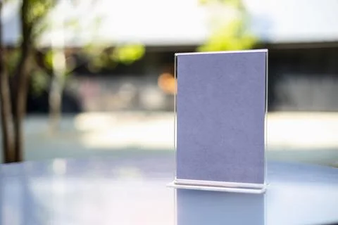 Stand Mock up Menu frame tent card blurred background design key visual lay.. Stock Photos