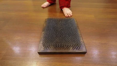 Stand on the nails Video stock 83729751