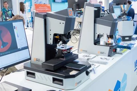 Stand with a new automatic microhardness tester Stock Photos