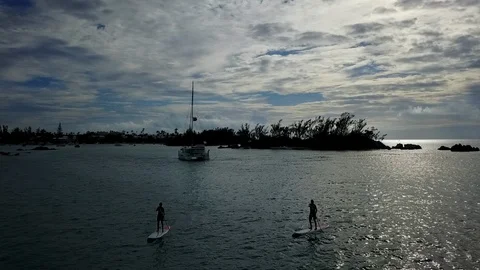 Stand up paddeling on sunset Stock Footage 85572849