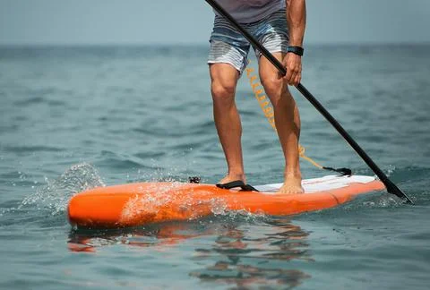 Stand up paddle board man Stock Photos