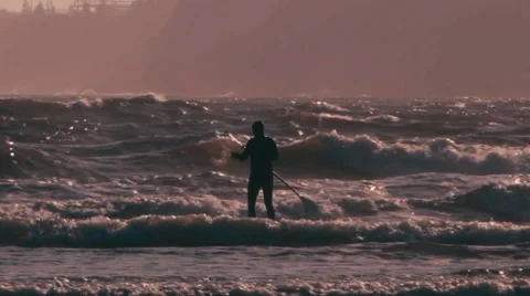 Stand up Paddle Board Surfer in Cold Water Waves. Stock Footage 68175612