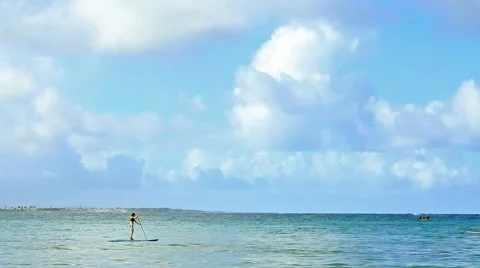 A stand up paddle boarder on the water Stock Footage 48518225