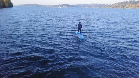 Stand Up Paddle Boarding on a Sunny Fall Day Video stock 97203225