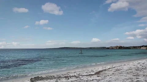 Stand Up Paddle Floating on Crystal Clear Water Stock Footage 153163888