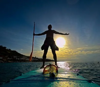 Stand up paddle in the sun Stock Photos