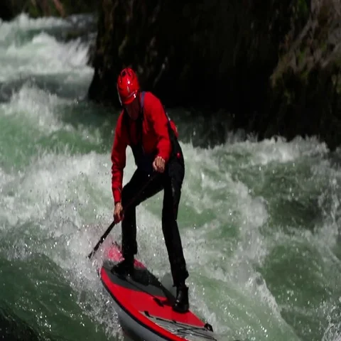 Stand Up Paddle through rapids. Stock Footage 69422750