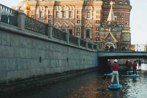 Stand up paddle walk along the river in Saint Petersburg festival in St. Pete Stock Photos