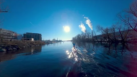 Stand up paddling crew training on the river Mus at Christmas time Stock Footage 167940258