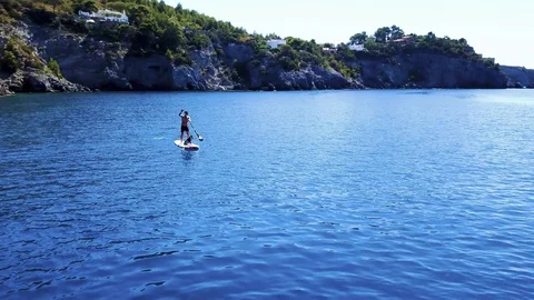 Stand up paddling man Stock Footage 122848842