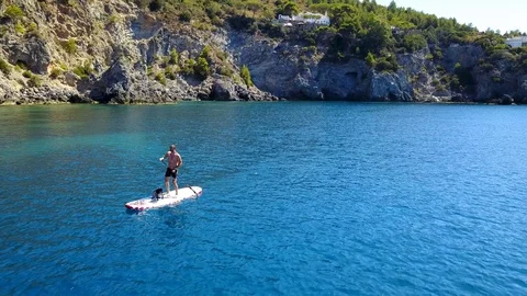 Stand up paddling man Stock Footage 122849107